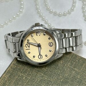 Silver Round Champagne Dial Watch